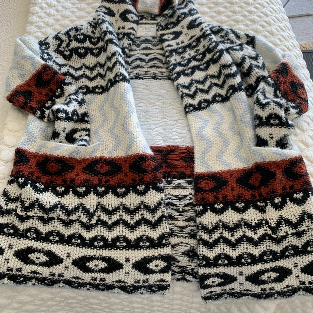 Cárdigan great look, pockets and hoodie.